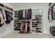 Large walk-in closet with ample shelving and hanging space at 34150 W Corleone Dr, Maricopa, AZ 85138