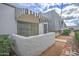 Side view of a condo showing the building's unique architectural style and landscaping at 3416 N 44Th St # 35, Phoenix, AZ 85018