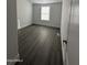 Bright bedroom with gray flooring and a window at 38007 W Mcdowell Rd, Tonopah, AZ 85354