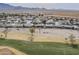 Aerial view of house next to golf course at 3888 E Hazeltine Way, Chandler, AZ 85249