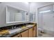 Bathroom with double sinks and granite countertops at 3888 E Hazeltine Way, Chandler, AZ 85249