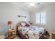 Cozy bedroom with a comfortable bed and window shutters at 3888 E Hazeltine Way, Chandler, AZ 85249