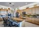 Island kitchen with granite countertops and ample cabinet space at 3888 E Hazeltine Way, Chandler, AZ 85249