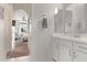 Bathroom with white cabinets and a view of a bedroom at 4165 E Toledo St, Gilbert, AZ 85295