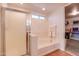 Bathroom with soaking tub, shower, and linen closet at 4340 E Silverbell Rd, San Tan Valley, AZ 85143