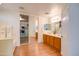 Bathroom with double vanity, large mirror, and walk-in shower at 4340 E Silverbell Rd, San Tan Valley, AZ 85143