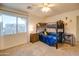 bedroom with bunk bed, dresser, and mini-fridge at 4340 E Silverbell Rd, San Tan Valley, AZ 85143