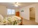 Bedroom with wood bed frame and closet at 4340 E Silverbell Rd, San Tan Valley, AZ 85143