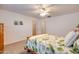 Bedroom with wood bed frame and closet at 4340 E Silverbell Rd, San Tan Valley, AZ 85143