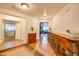 Bright entryway with wood floors and views into living and dining areas at 4340 E Silverbell Rd, San Tan Valley, AZ 85143