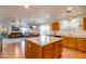 Open concept kitchen with island, looking into living room at 4340 E Silverbell Rd, San Tan Valley, AZ 85143