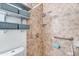 Accessible shower with grab bar and storage shelves at 4340 E Silverbell Rd, San Tan Valley, AZ 85143