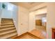 Carpeted staircase leading to upper level; view of bedroom and closet at 4340 E Silverbell Rd, San Tan Valley, AZ 85143