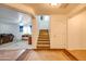 Carpeted staircase with view of living room and upper floor at 4340 E Silverbell Rd, San Tan Valley, AZ 85143