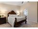 Serene bedroom with ensuite bathroom access and large bed at 4611 E Red Bird Rd, Cave Creek, AZ 85331