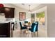 Bright kitchen nook with bay window and round table at 4611 E Red Bird Rd, Cave Creek, AZ 85331