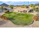 Aerial view showcasing the house's backyard and landscape at 4805 W Saguaro Park Ln, Glendale, AZ 85310