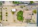 Bird's eye view of house, yard, and surrounding neighborhood at 4805 W Saguaro Park Ln, Glendale, AZ 85310