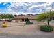 Single story home with desert landscaping and mountain views at 4805 W Saguaro Park Ln, Glendale, AZ 85310