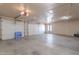 Large garage with ample space for parking and storage at 4805 W Saguaro Park Ln, Glendale, AZ 85310