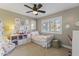 Charming bedroom with a twin-size bed and plenty of natural light at 5134 N 33Rd St, Phoenix, AZ 85018