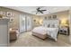 Bright bedroom with a king-size bed, and french doors leading outside at 5134 N 33Rd St, Phoenix, AZ 85018