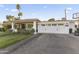 Home with paved driveway, landscaping, and a basketball hoop at 5134 N 33Rd St, Phoenix, AZ 85018