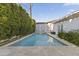 Inviting rectangular pool with surrounding stone patio at 5134 N 33Rd St, Phoenix, AZ 85018