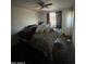 Bedroom with double bed and ceiling fan at 5616 W Granada Rd, Phoenix, AZ 85035