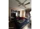 Bedroom with double bed, closet, and ceiling fan at 5616 W Granada Rd, Phoenix, AZ 85035