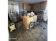 Kitchen area with stainless steel appliances and an island at 5616 W Granada Rd, Phoenix, AZ 85035