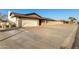 Single-story home with attached garage and driveway at 5732 W Purdue Ave, Glendale, AZ 85302