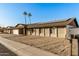 Single-story home on a quiet street with landscaping at 5732 W Purdue Ave, Glendale, AZ 85302