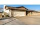 Single-story home with attached garage and driveway at 5732 W Purdue Ave, Glendale, AZ 85302