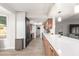 Modern kitchen with white countertops and wooden cabinets at 5732 W Purdue Ave, Glendale, AZ 85302