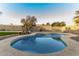 Inviting kidney-shaped pool with ample patio space at 5732 W Purdue Ave, Glendale, AZ 85302