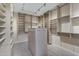 Large walk-in closet with ample shelving and hanging space at 6429 E Everett Dr, Scottsdale, AZ 85254