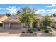 Beautiful one-story home with a two-car garage and desert landscaping at 6429 E Everett Dr, Scottsdale, AZ 85254