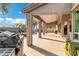 Covered patio with built-in grill and pool view at 6429 E Everett Dr, Scottsdale, AZ 85254