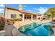 Inviting kidney-shaped pool with flagstone decking at 6429 E Everett Dr, Scottsdale, AZ 85254