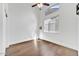 Well-lit bedroom with hardwood floors and ceiling fan at 6502 E Blanche Dr, Scottsdale, AZ 85254