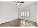 Bright bedroom with hardwood floors and plantation shutters at 6502 E Blanche Dr, Scottsdale, AZ 85254