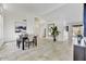 Elegant dining room with dark wood table and large art piece at 6502 E Blanche Dr, Scottsdale, AZ 85254