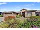 Single-story home with attractive landscaping and a two-car garage at 6502 E Blanche Dr, Scottsdale, AZ 85254