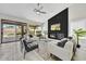 Bright living room with fireplace and sliding glass doors leading to backyard at 6502 E Blanche Dr, Scottsdale, AZ 85254