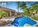 Inviting pool with a unique shape and rock feature at 6502 E Blanche Dr, Scottsdale, AZ 85254