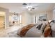 Spacious bedroom features neutral color scheme, ceiling fan, and natural light at 701 W Cambridge Ave, Phoenix, AZ 85007