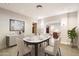 This bright dining room offers modern decor and direct access to the rest of the open floor plan at 701 W Cambridge Ave, Phoenix, AZ 85007