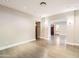 An inviting living room featuring hardwood floors and neutral walls, offering a versatile space for living at 701 W Cambridge Ave, Phoenix, AZ 85007