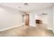 Large living room featuring hardwood floors, recessed lighting, and access to an adjacent room at 701 W Cambridge Ave, Phoenix, AZ 85007